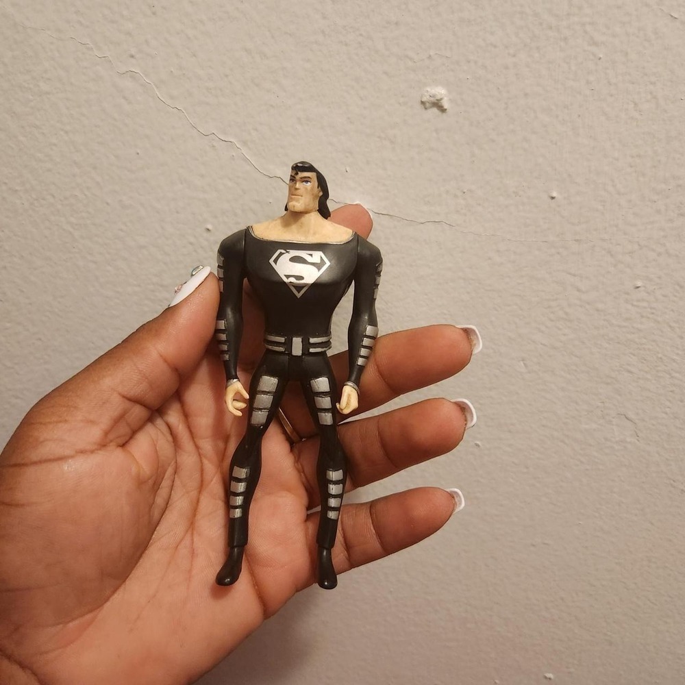 2007 DC Direct Superman: Doomsday Solar Suit Superman action figure.